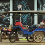 Tuktuk driver having a rest