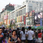 A busy modern shopping district near Wangfujing Snack Street