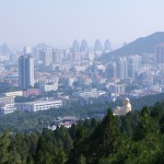 The giant golden Buddha keeps an eye on Jinan city