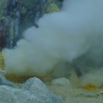 White steam coming from the sulfur springs